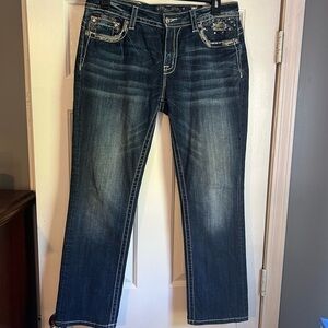 Miss Me mid rise straight jeans. Size 32. These have been hemmed.